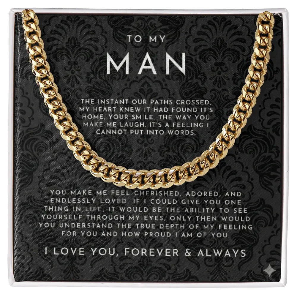 Gold chain necklace displayed on black patterned card with romantic message to my man