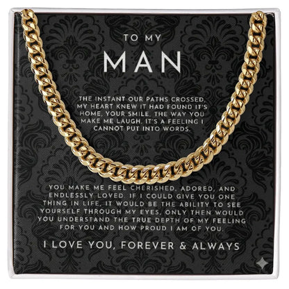 Gold chain necklace displayed on black patterned card with romantic message to my man