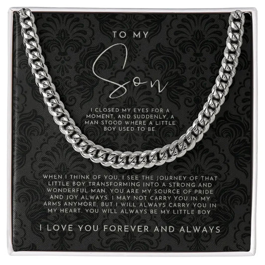 Silver chain necklace on black card with sentimental message to son about growing into a strong man