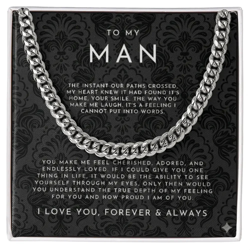 Silver chain necklace on a black decorative card with a romantic message to my man, expressing love and pride