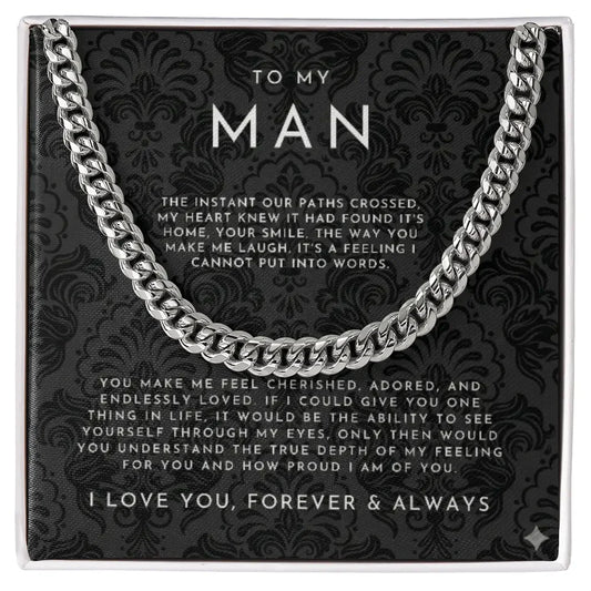 Silver chain necklace on a black decorative card with a romantic message to my man, expressing love and pride